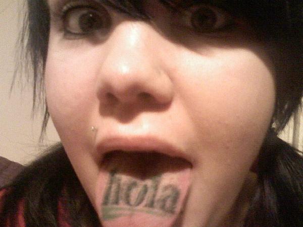 Hola Text Tongue Tattoo Design