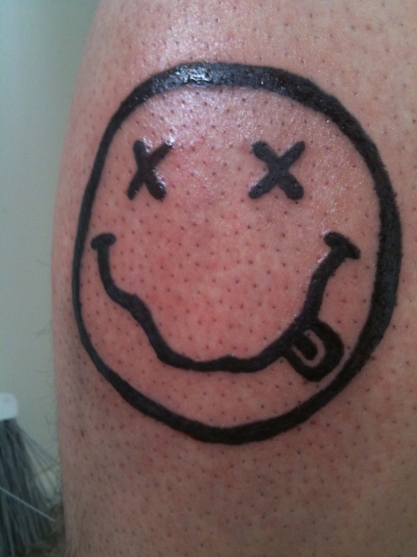 Nirvana smiley face tattoo design
